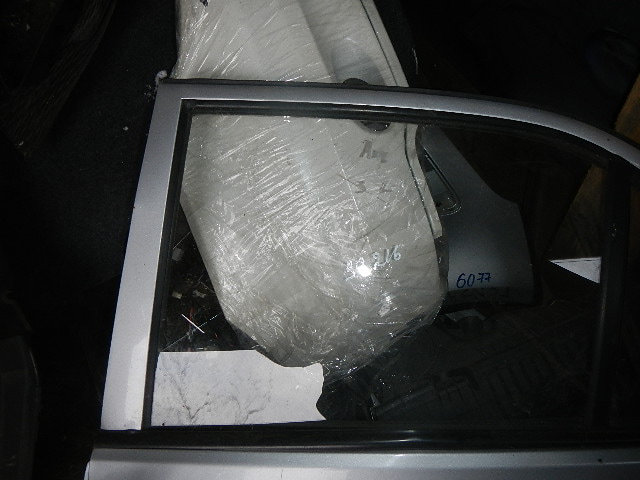 Стекло двери задней левой