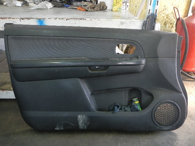 Обшивка двери передней левой