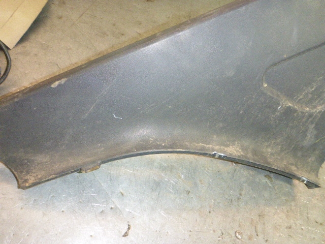 Накладка переднего крыла левого