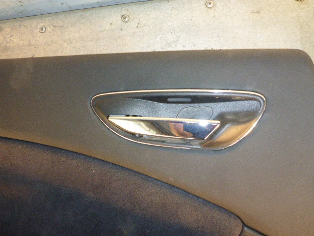 Обшивка двери задней левой