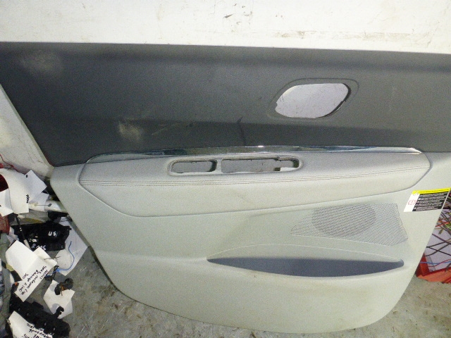 Обшивка двери передней левой