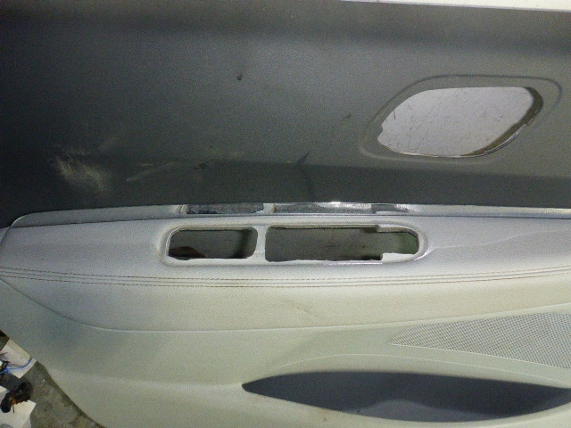 Обшивка двери передней левой