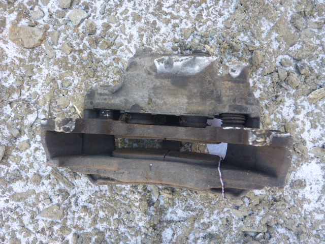 Суппорт задний левый