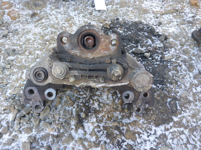 Суппорт задний левый