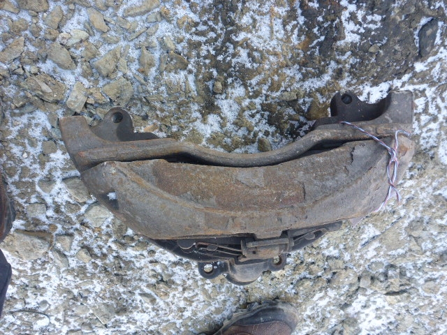 Суппорт задний левый