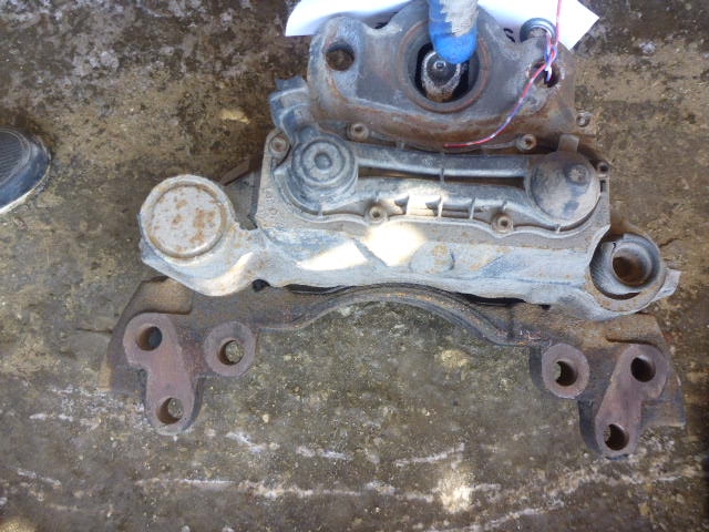 Суппорт задний левый