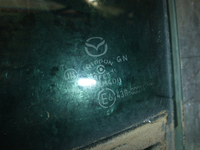 Стекло двери задней левой