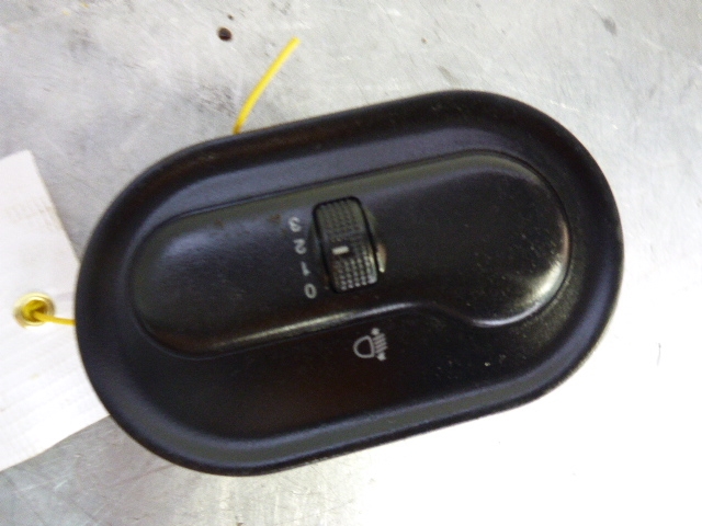 Кнопка корректора фар