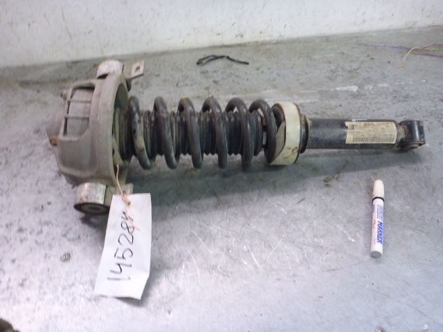 Амортизатор задний левый