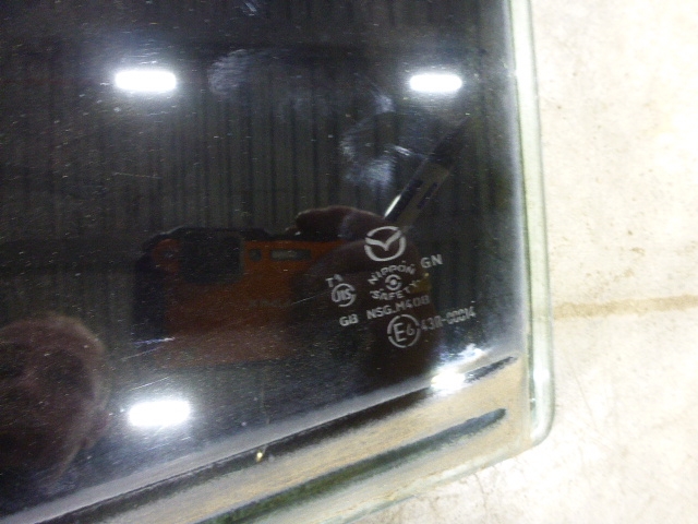 Стекло двери задней левой