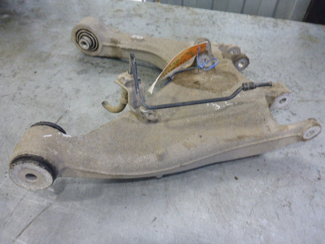 Рычаг задний нижний