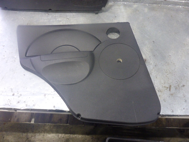 Обшивка двери задней левой