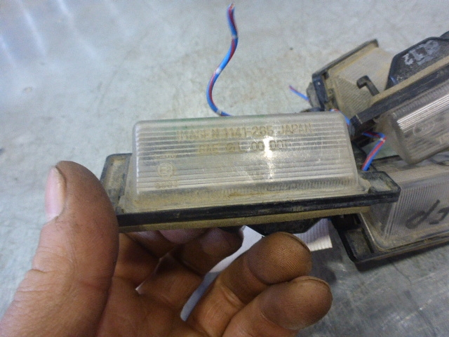 Фонарь подсветки номера