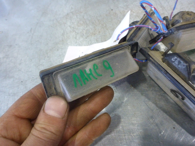 Фонарь подсветки номера