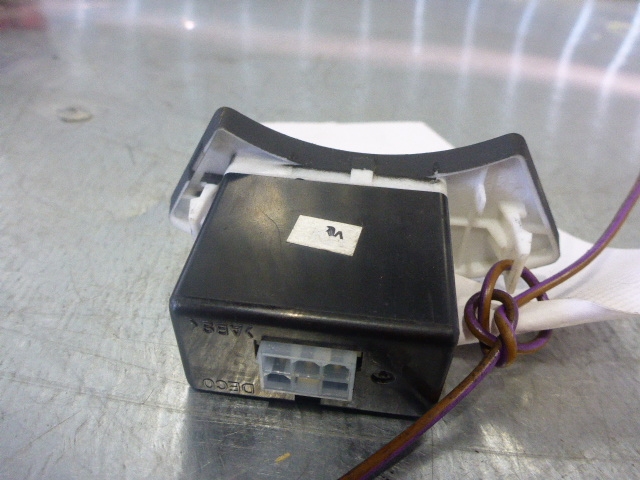 Кнопка корректора фар