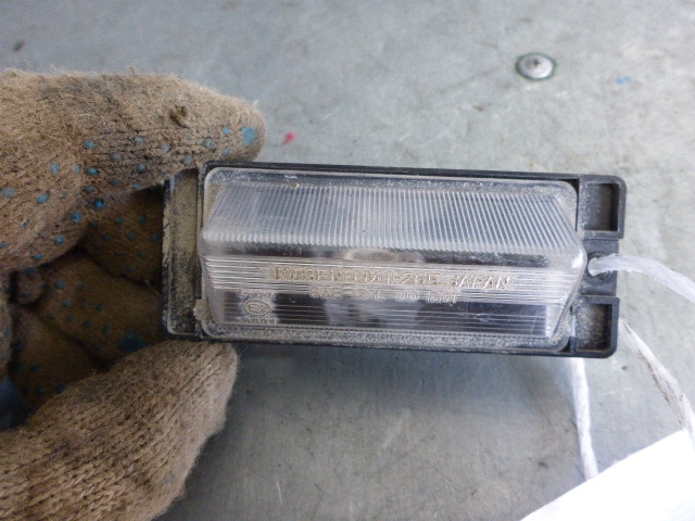 Фонарь подсветки номера