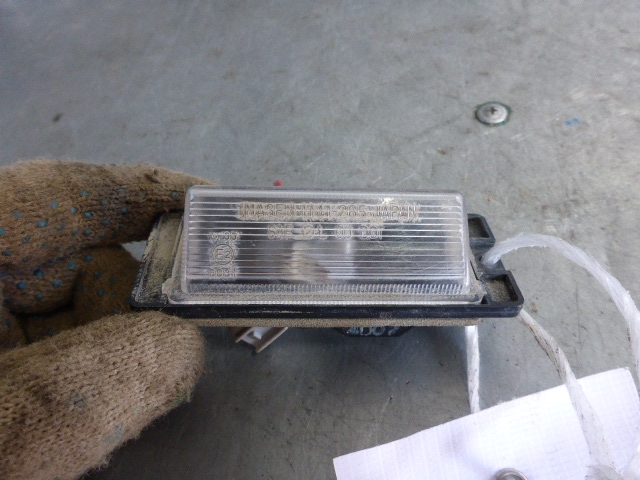 Фонарь подсветки номера