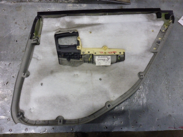 Обшивка двери задней левой