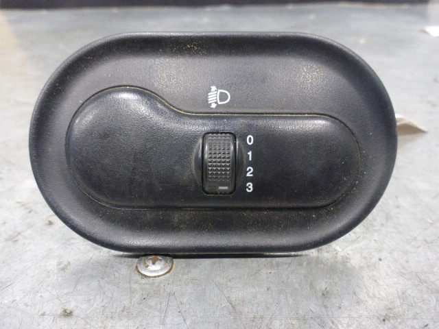 Кнопка корректора фар