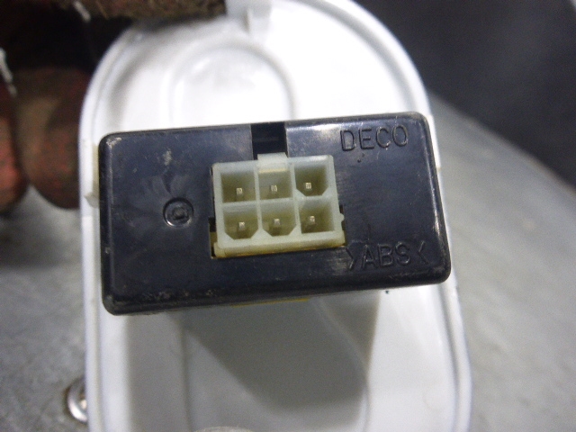 Кнопка корректора фар