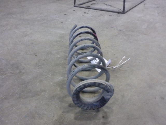 Пружина задняя