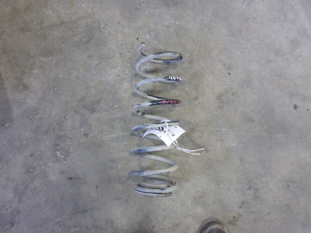 Пружина задняя