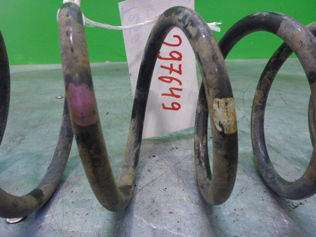 Пружина задняя