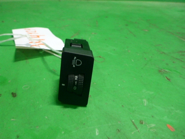 Кнопка корректора фар