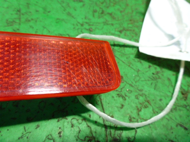 Отражатель в бампер задний левый