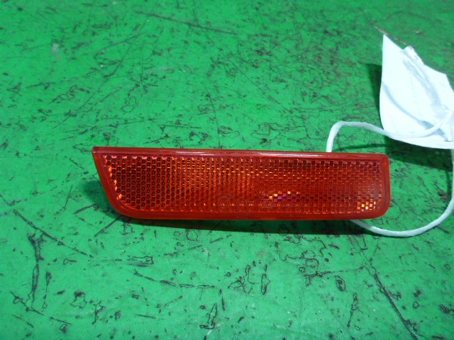 Отражатель в бампер задний левый