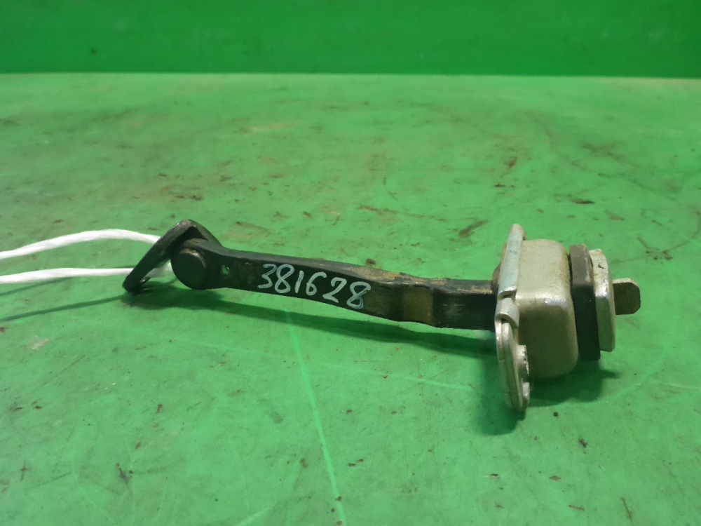 Ограничитель двери