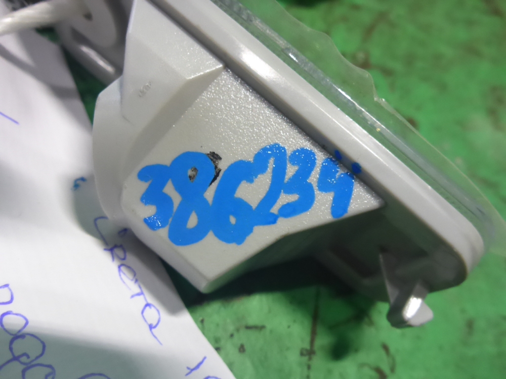 Фонарь подсветки номера