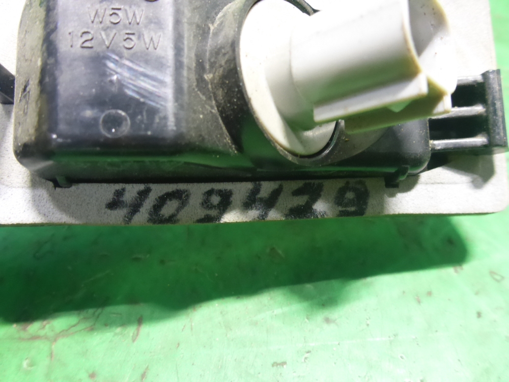 Фонарь подсветки номера