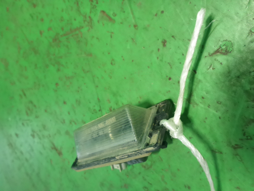 Фонарь подсветки номера