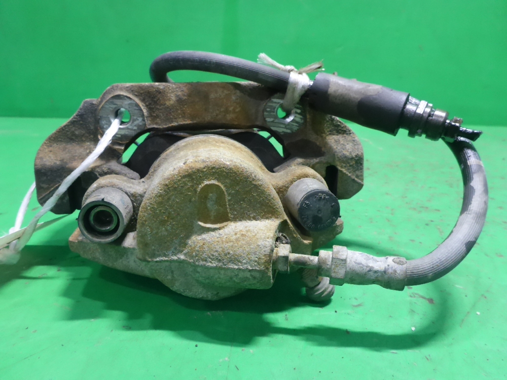 Суппорт передний левый