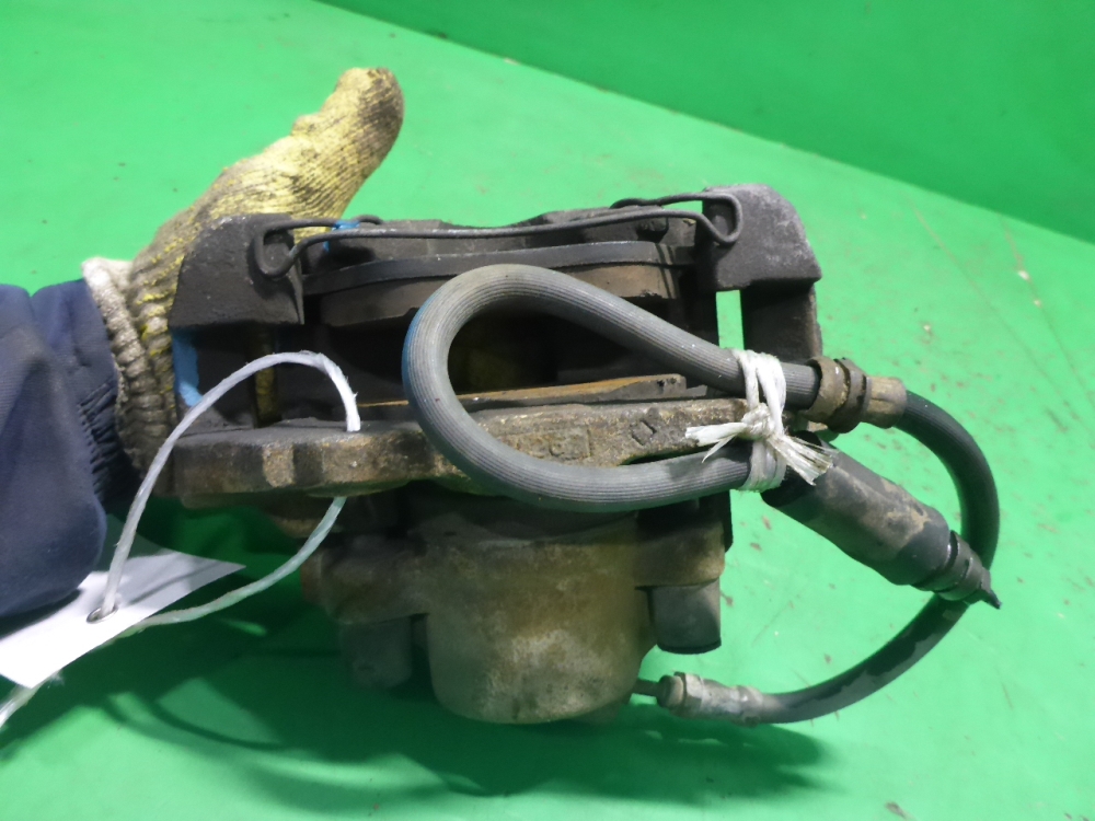 Суппорт передний левый