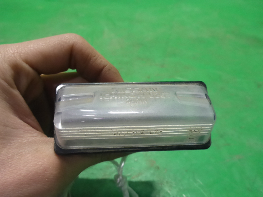 Фонарь подсветки номера