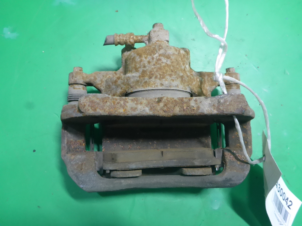 Суппорт передний левый