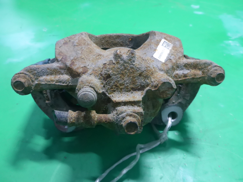 Суппорт передний левый