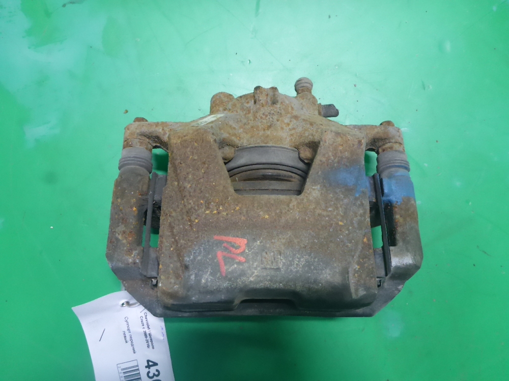 Суппорт передний левый