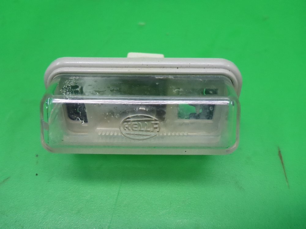 Фонарь подсветки номера