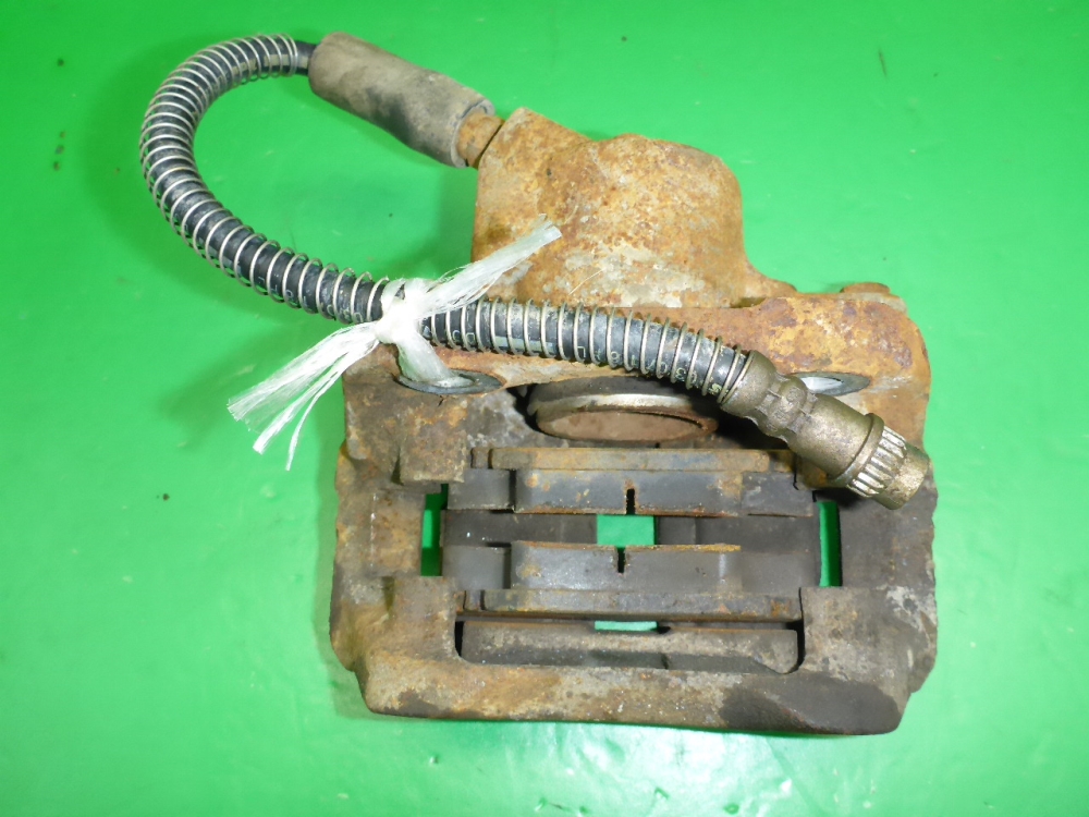 Суппорт передний левый