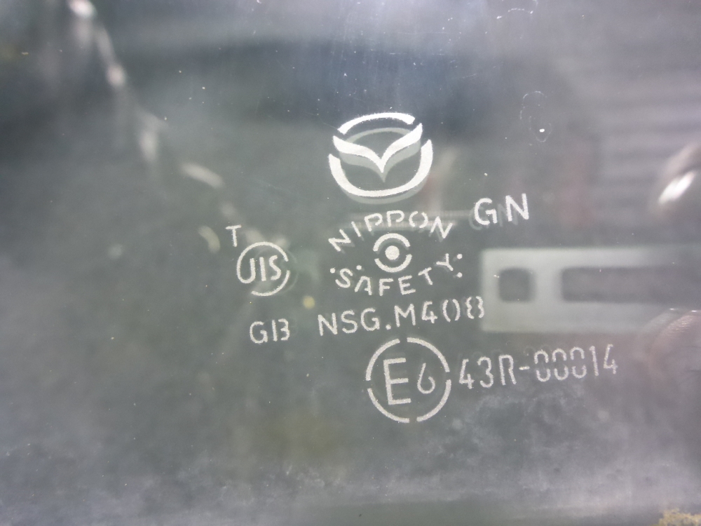 Стекло двери задней левой