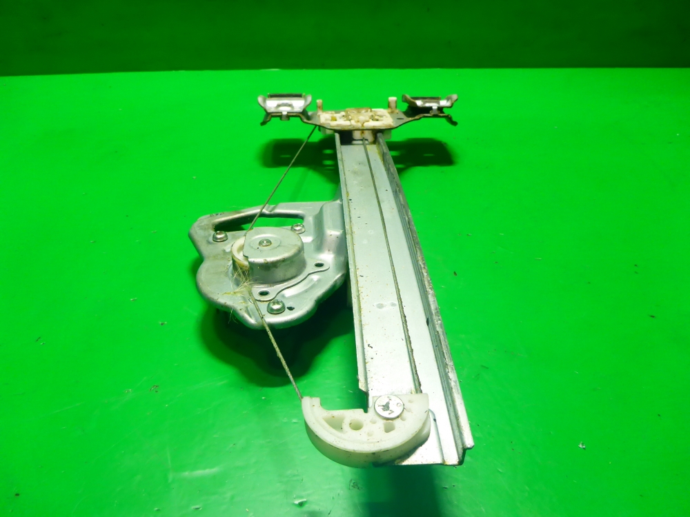 Стеклоподъемник электр. задний левый