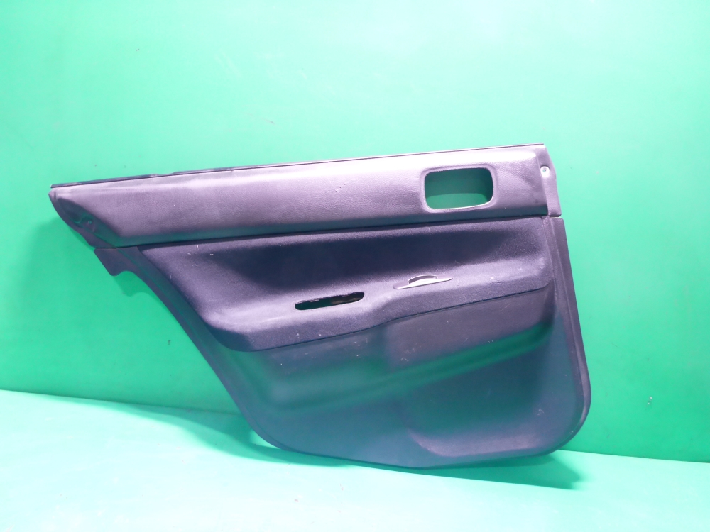 Обшивка двери задней левой