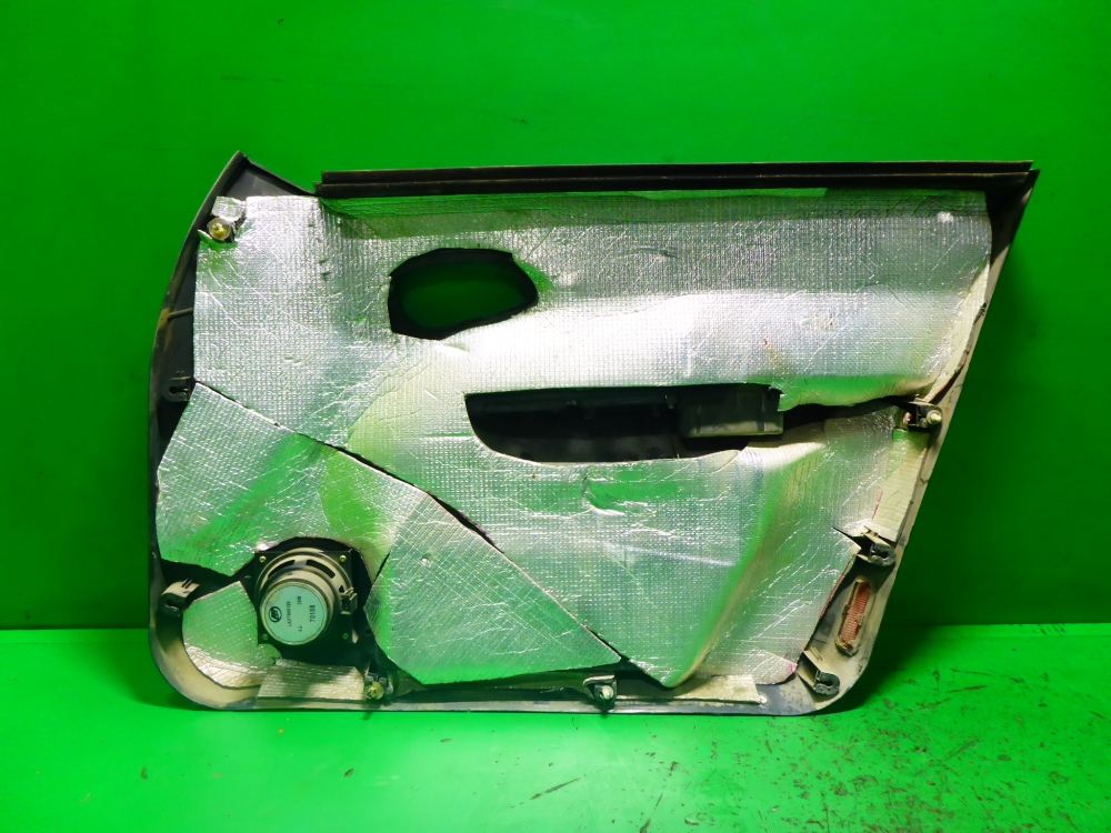 Обшивка двери передней левой