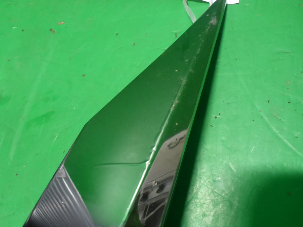 Планка под фару левая