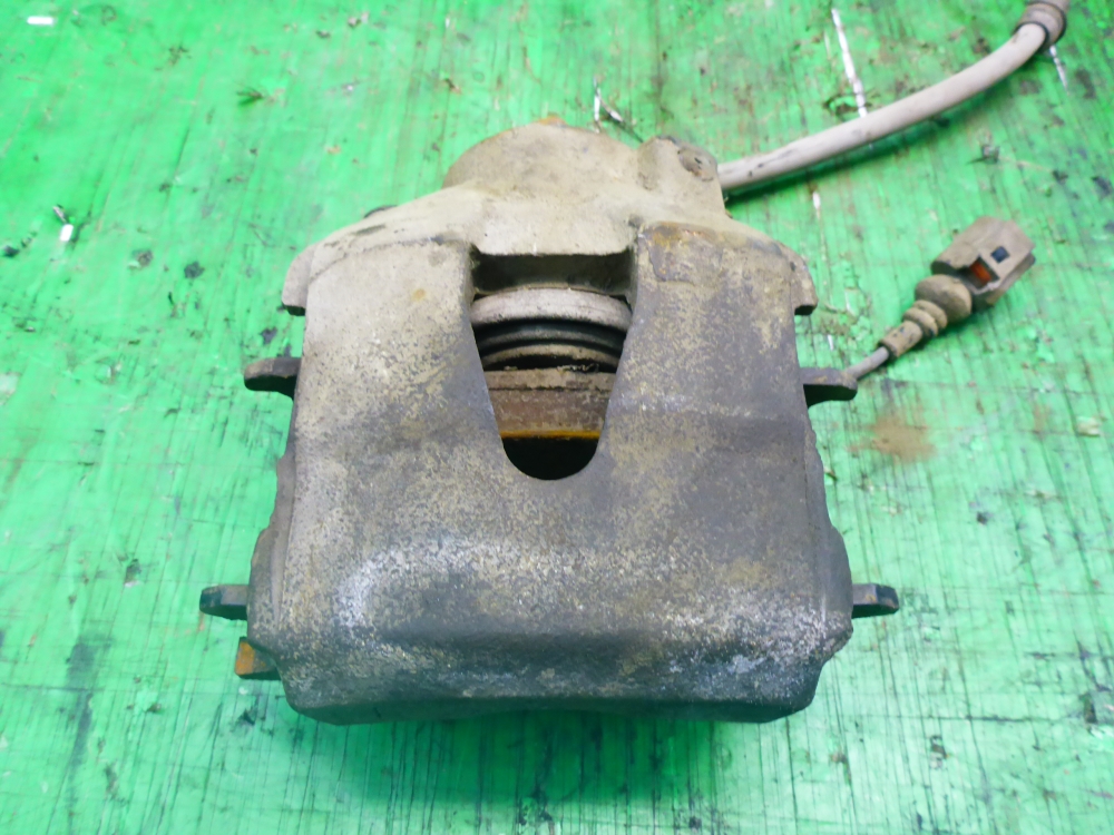 Суппорт передний левый