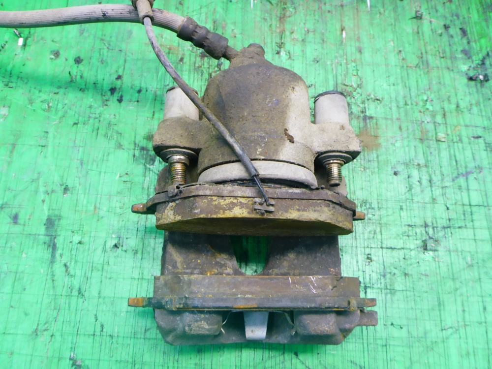 Суппорт передний левый