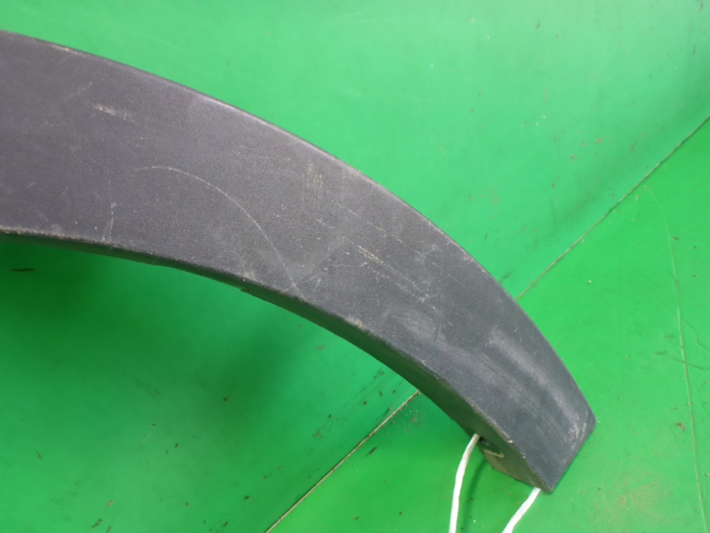 Накладка заднего крыла левого